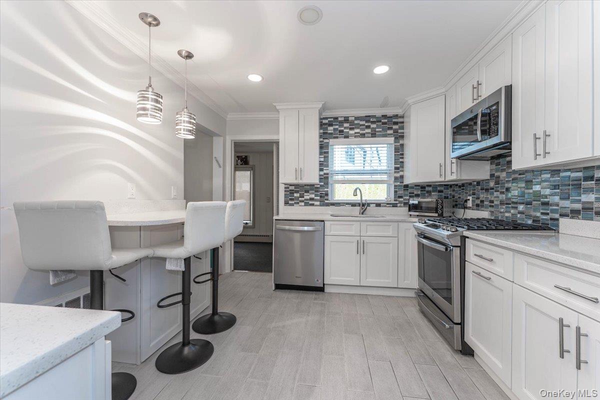 #5 photo, 850 Ibsen Street, ナッソー郡 Woodmere , NY 11598