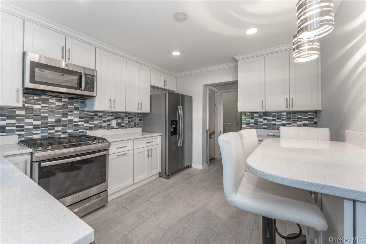 #6 photo, 850 Ibsen Street, ナッソー郡 Woodmere , NY 11598