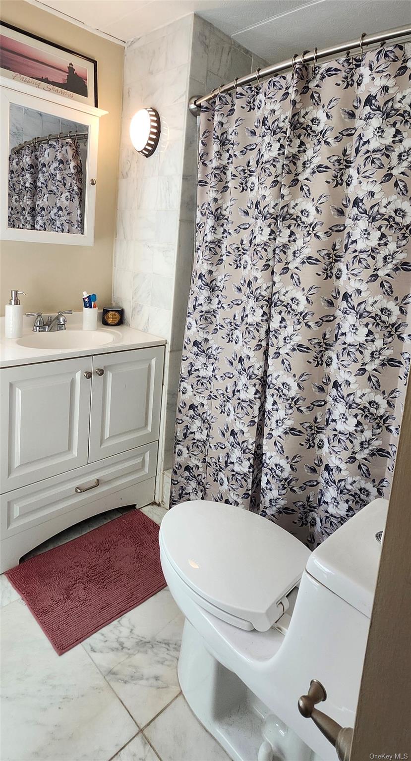 #8 photo, 75 Minuteman Drive, サフォーク郡 Bohemia , NY 11716