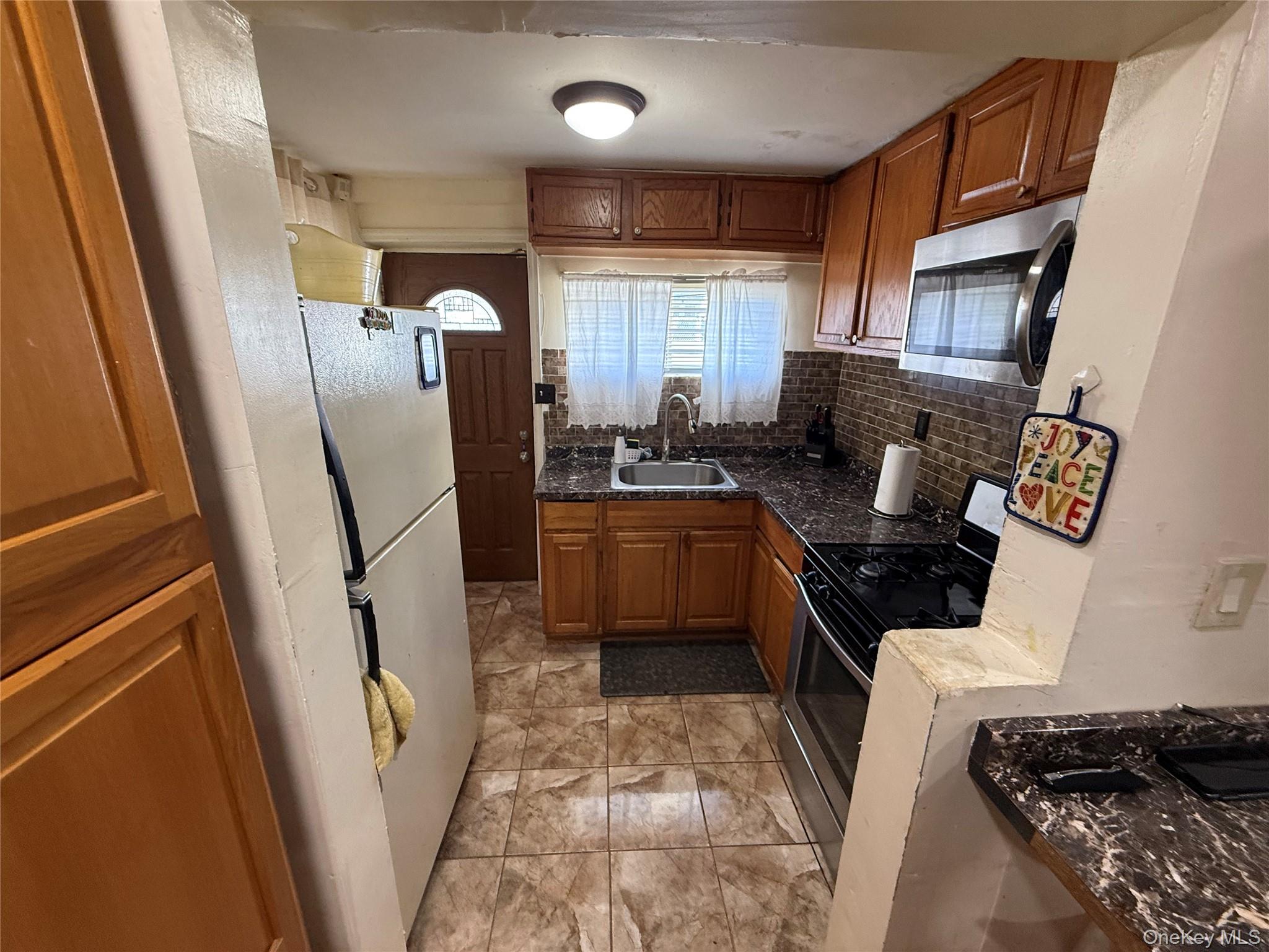 #5 photo, 23027 148th Avenue, Springfield Gardens , NY 11413