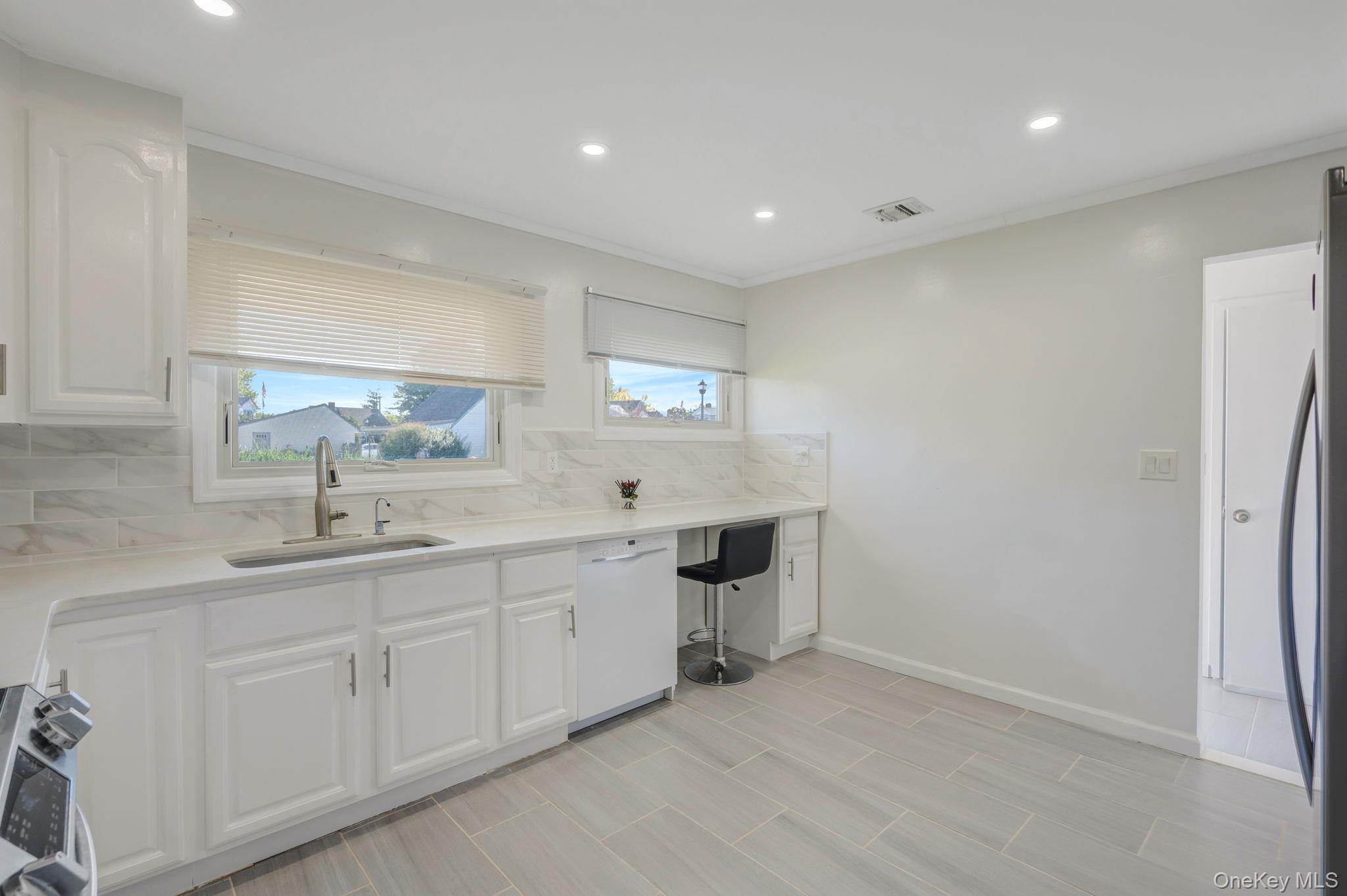 #10 photo, 26 Sky Lane, Levittown , NY 11756