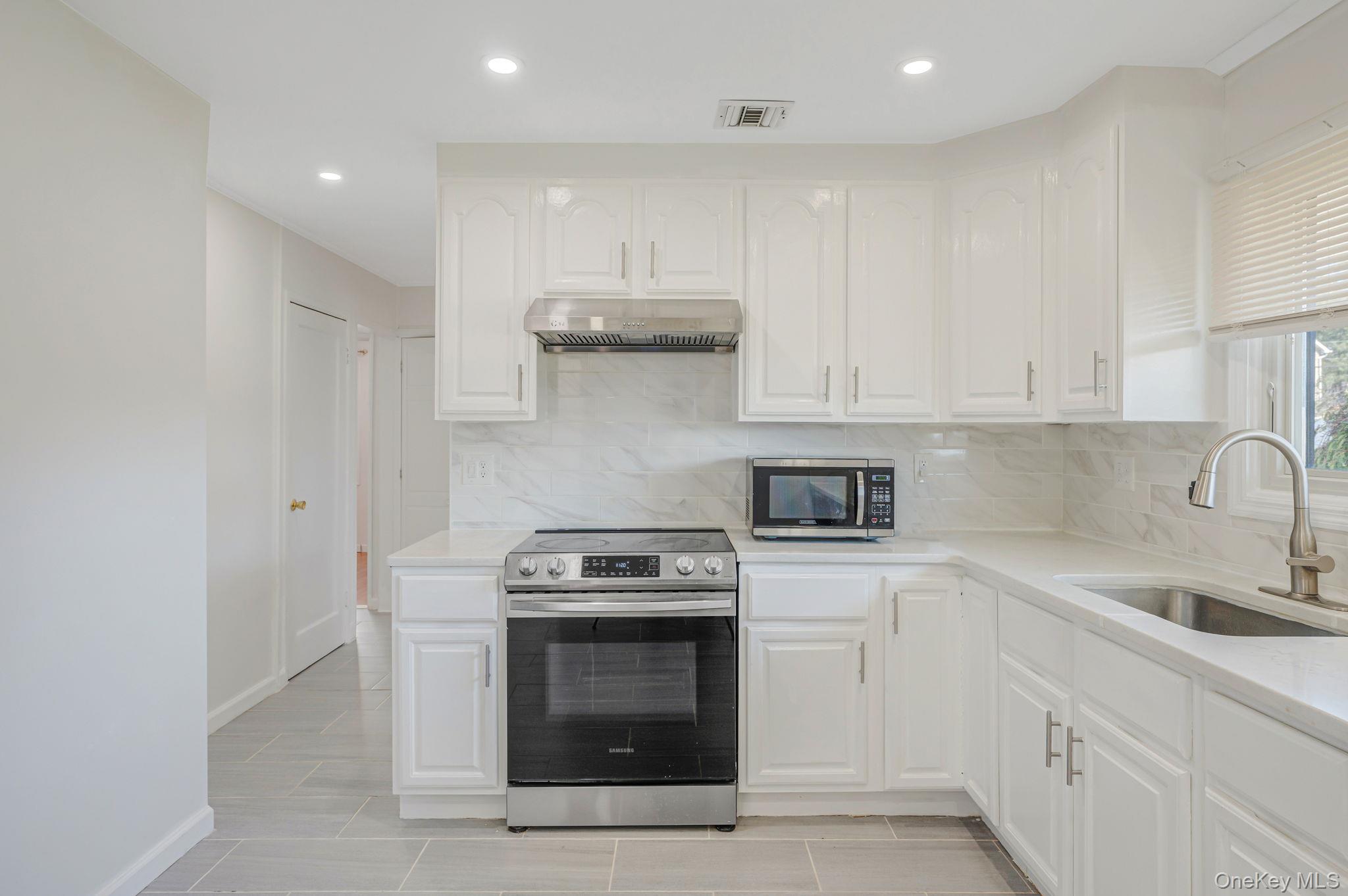 #8 photo, 26 Sky Lane, Levittown , NY 11756