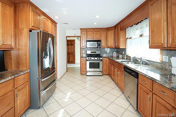 #13 photo, 81 Ward Street, Westbury , NY 11590