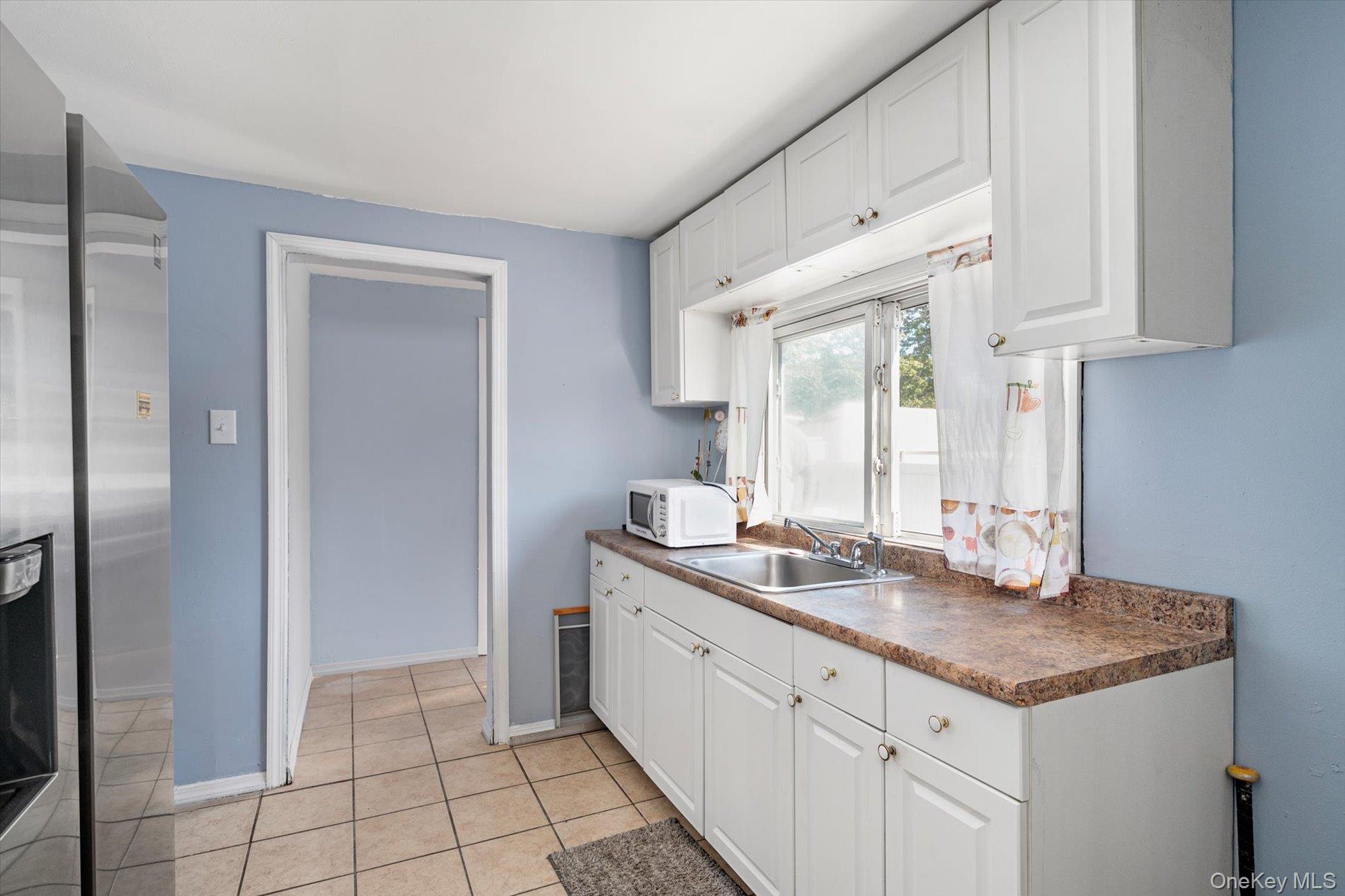 #7 photo, 119 Lincoln Avenue, Roosevelt , NY 11575