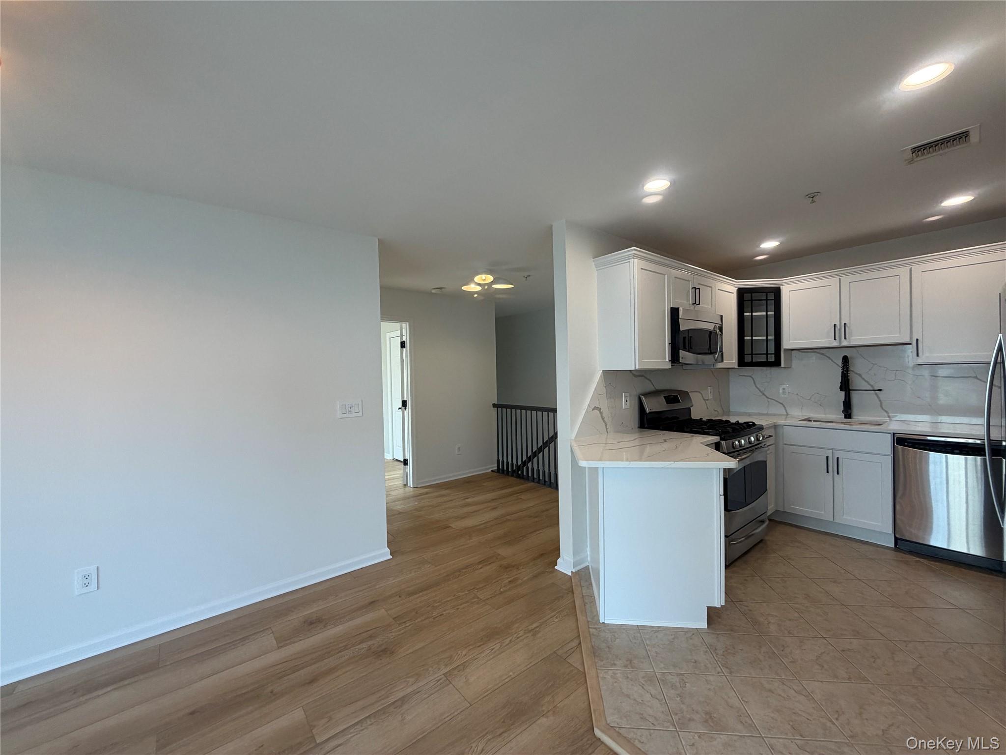 #13 photo, 157 Brattle Circle, Melville , NY 11747