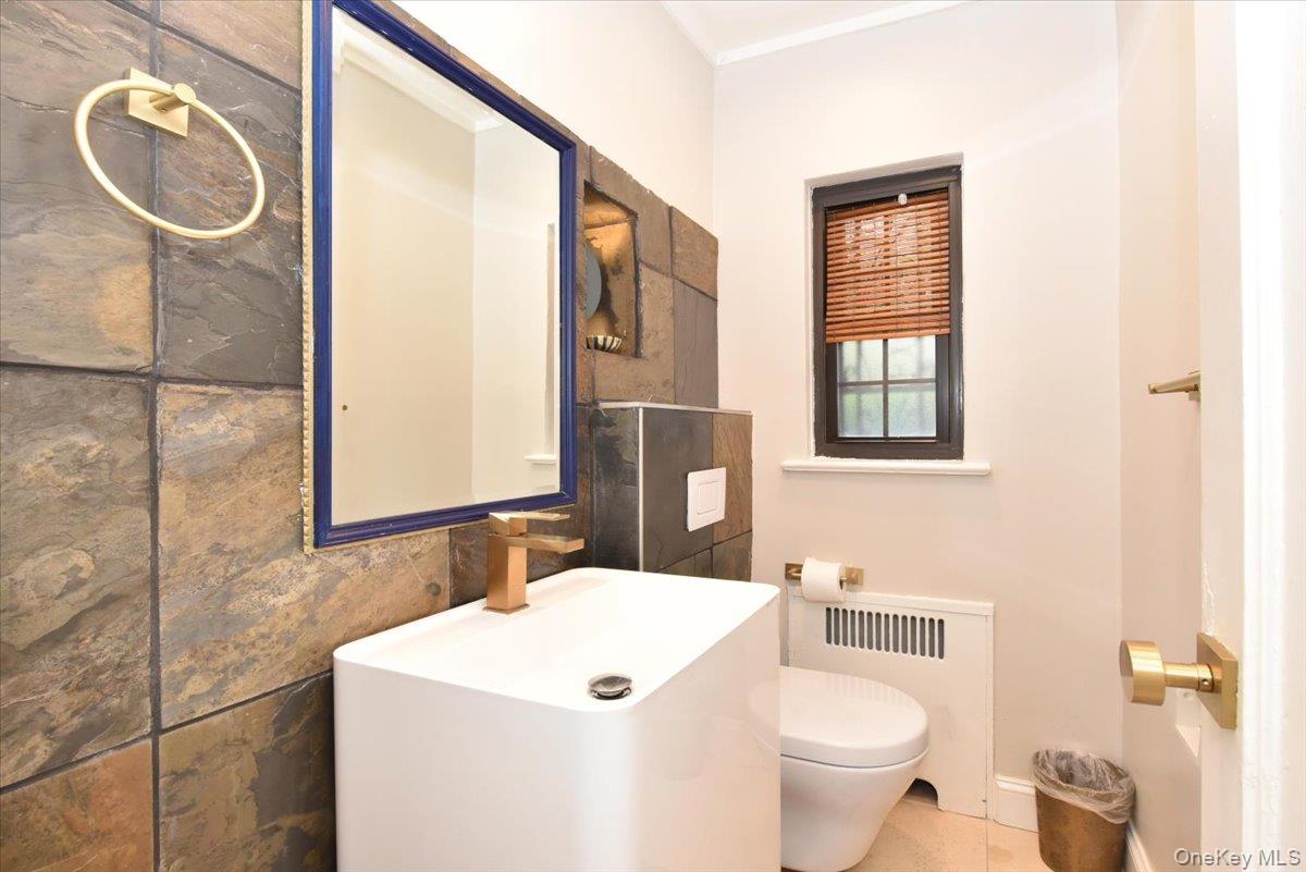 #13 photo, 85-35 Edgerton Boulevard, Jamaica Estates , NY 11432