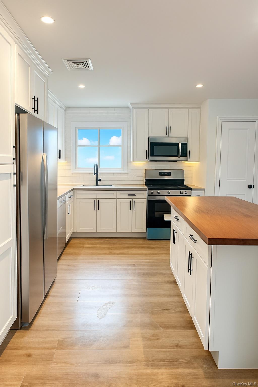 #3 photo, 1269 Dekoven Street, Rockville Centre , NY 11570