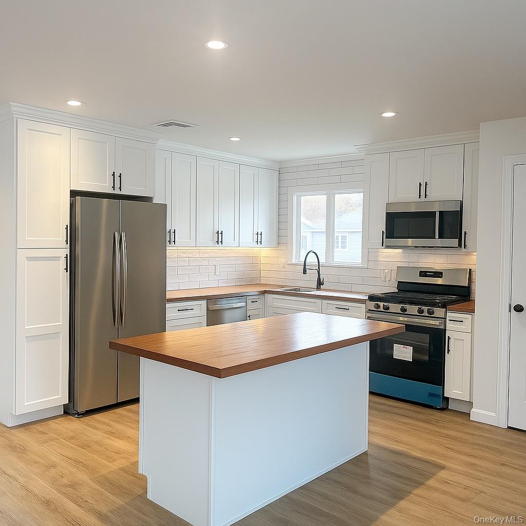 #4 photo, 1269 Dekoven Street, Rockville Centre , NY 11570