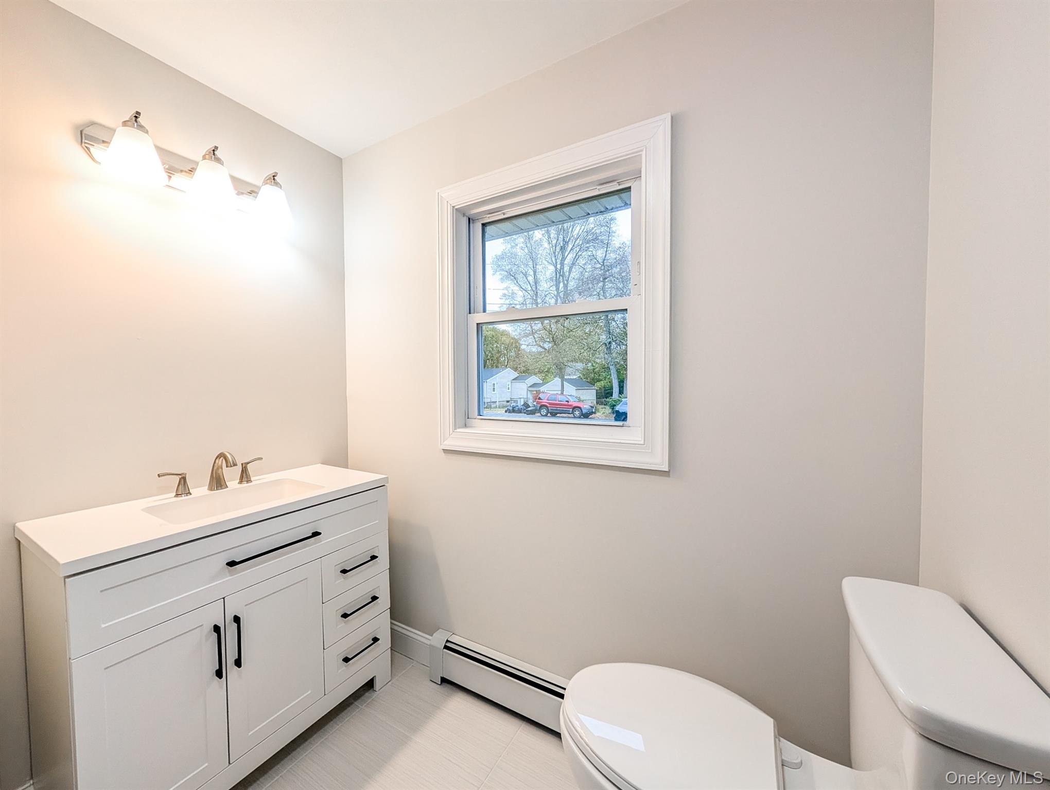 #14 photo, 25 Woodland Road, サフォーク郡 Centereach , NY 11720