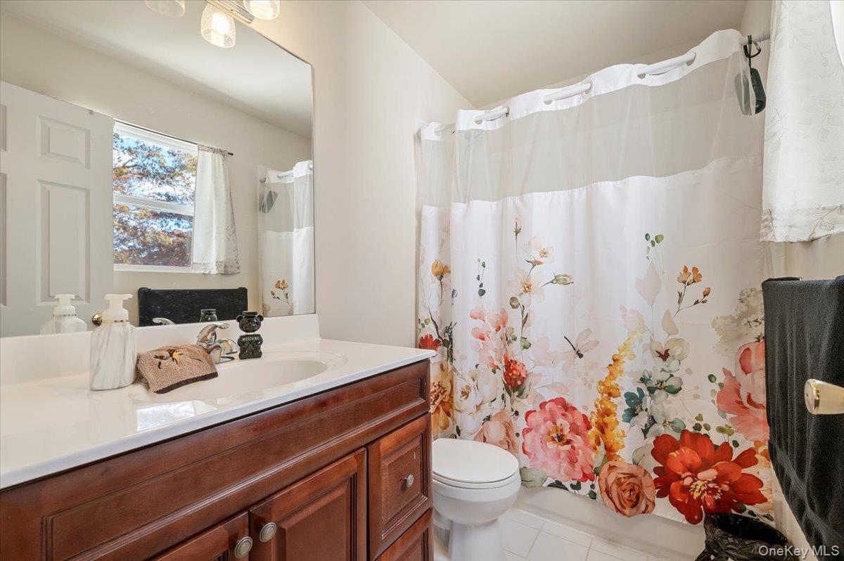 #12 photo, 64 E Margin Road, Ridge , NY 11961