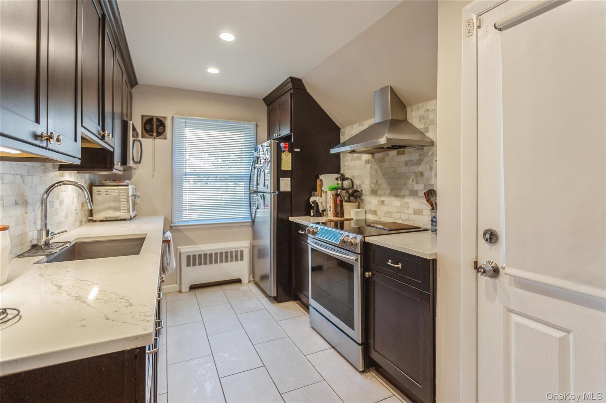 #11 photo, 1531 Merrick Avenue, Merrick , NY 11566