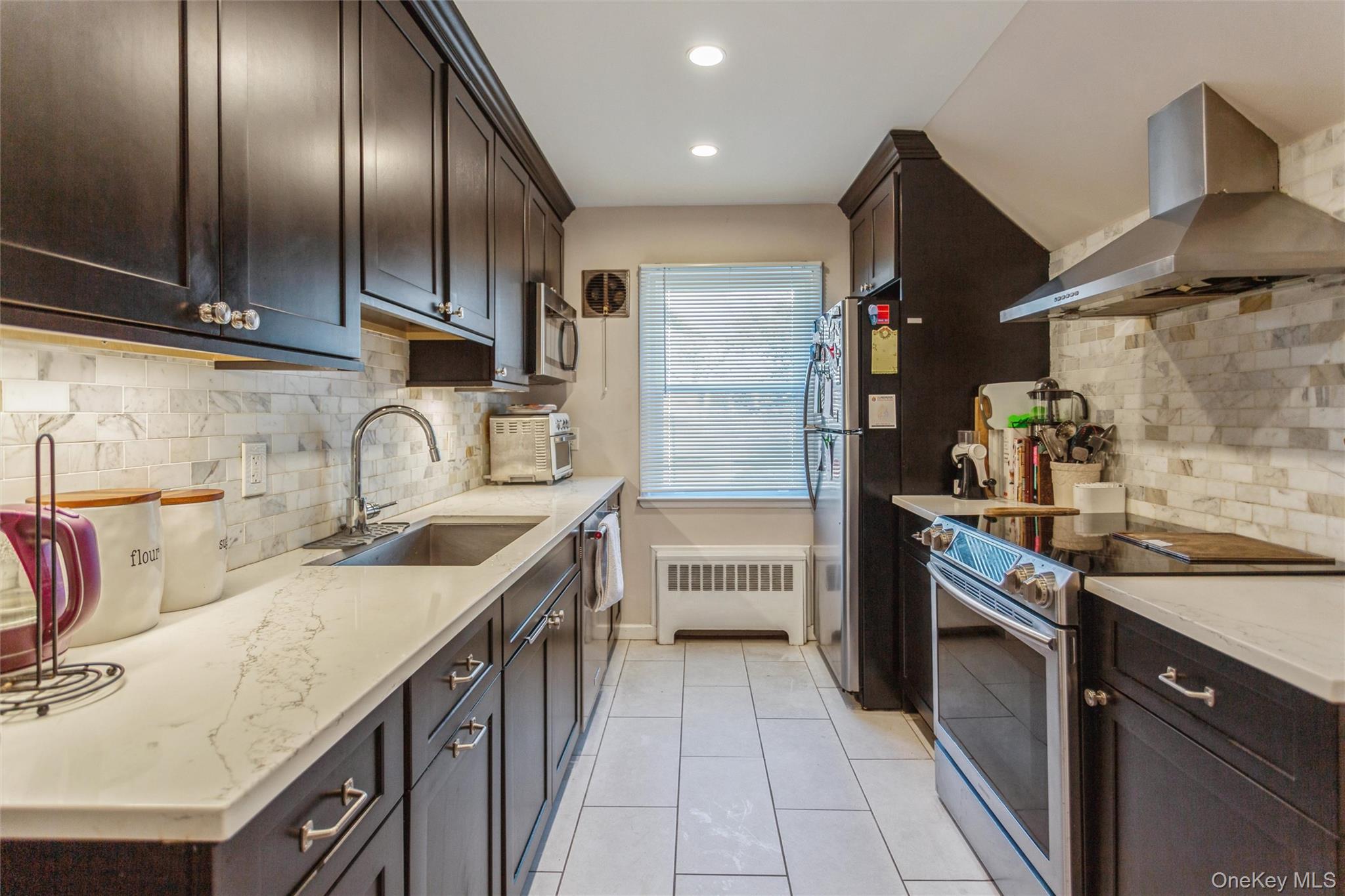 #12 photo, 1531 Merrick Avenue, Merrick , NY 11566