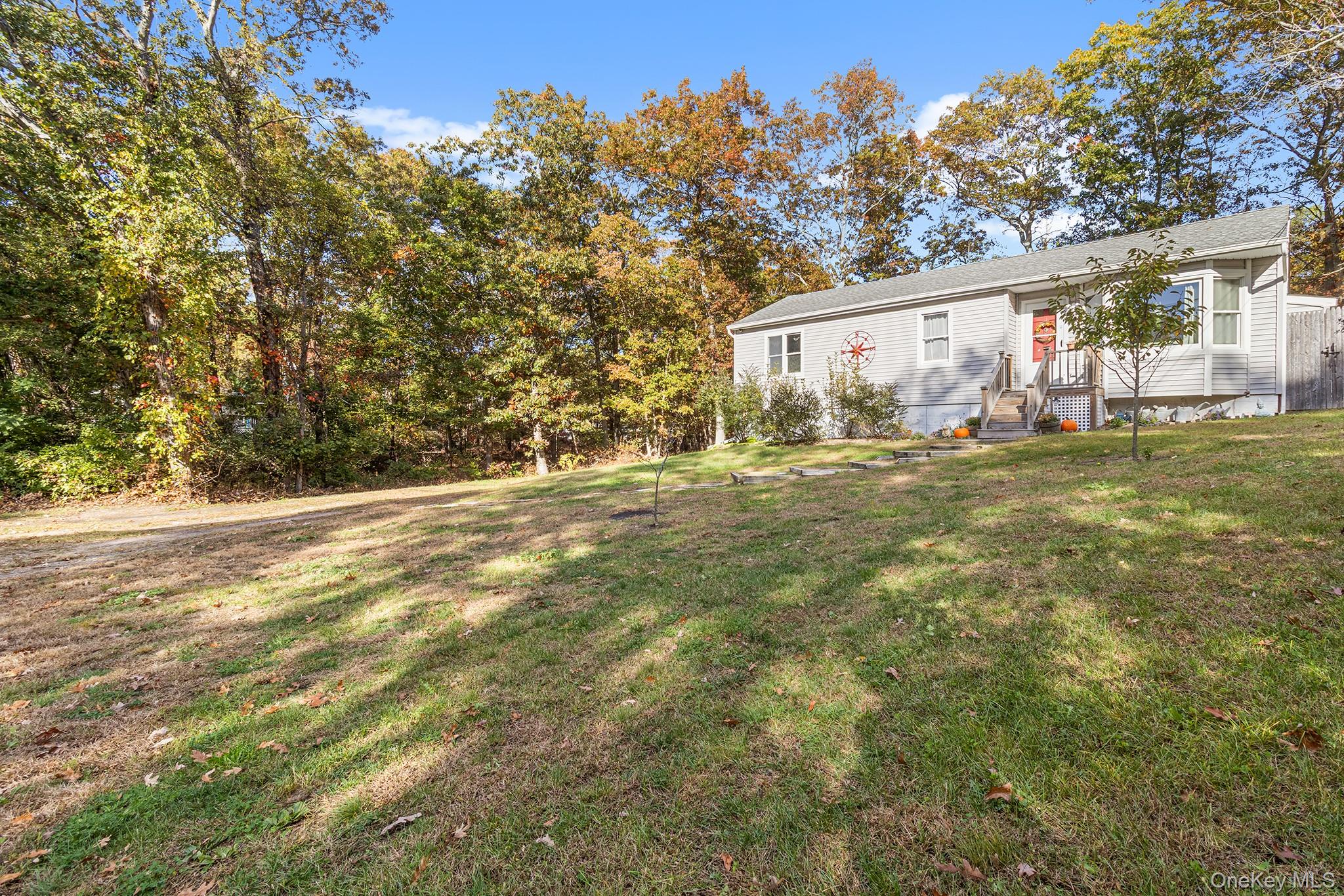 #2 photo, 55 Newcomb Trail, Ridge , NY 11961