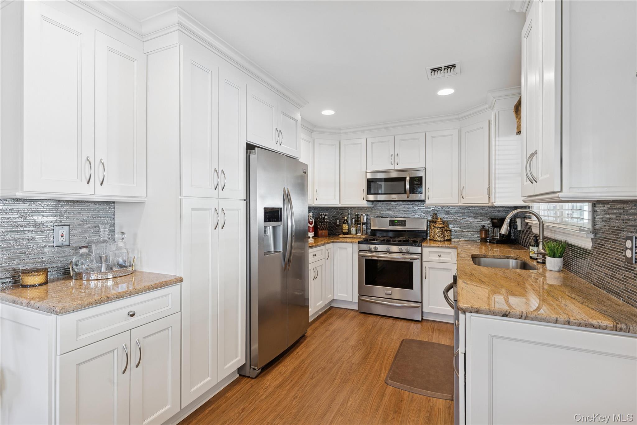 #11 photo, 31 Grand Central Avenue, Amityville , NY 11701