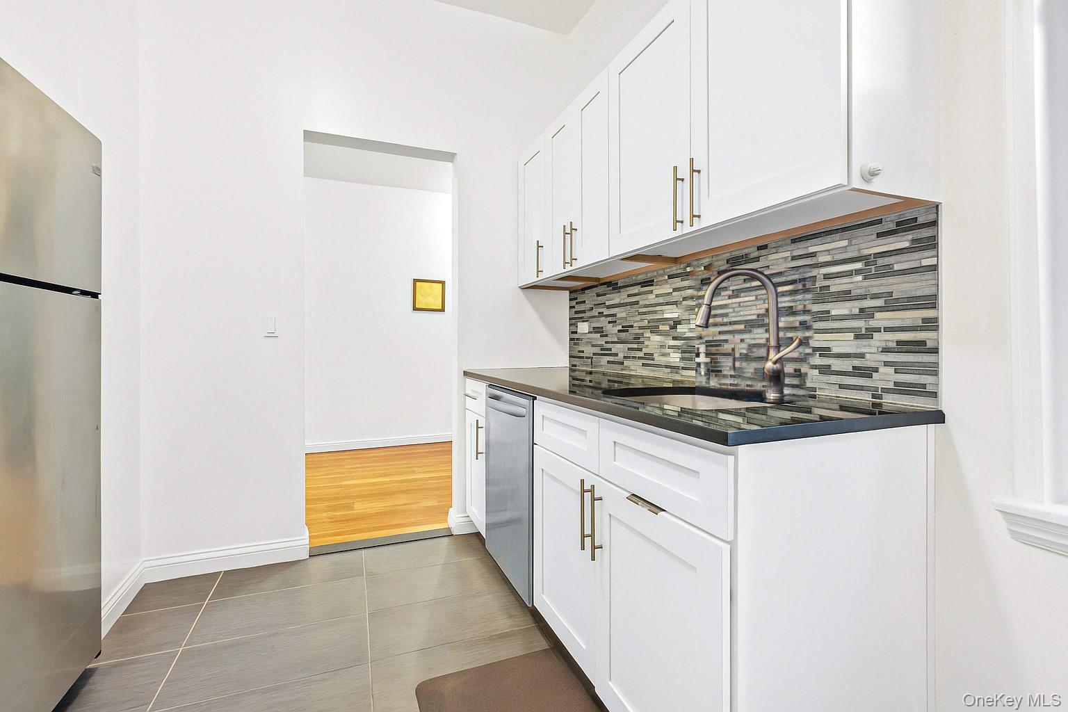 #14 photo, 115-25 Metropolitan Avenue, Kew Gardens , NY 11375