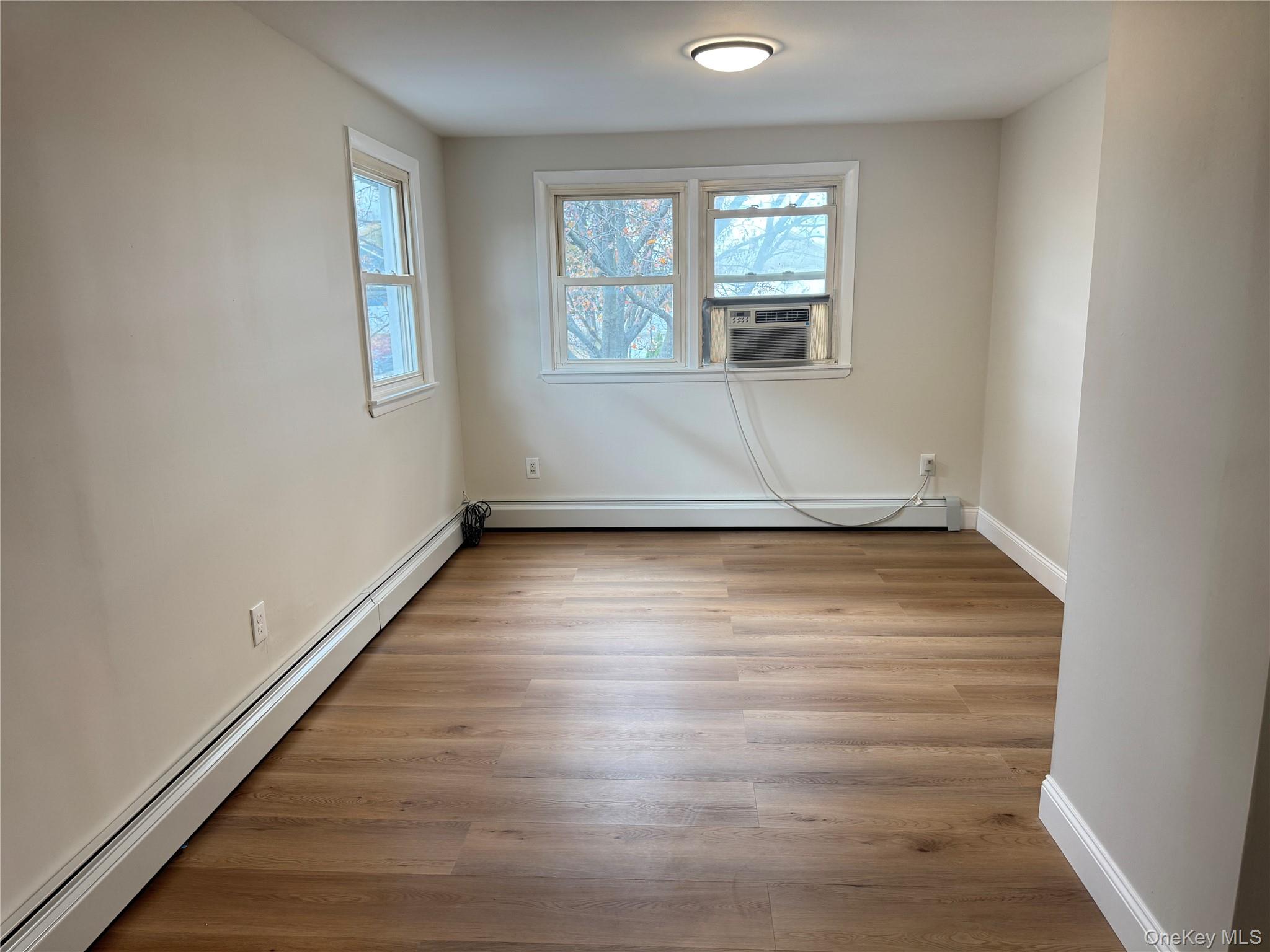 #5 photo, 129 Spring Lane, Levittown , NY 11756