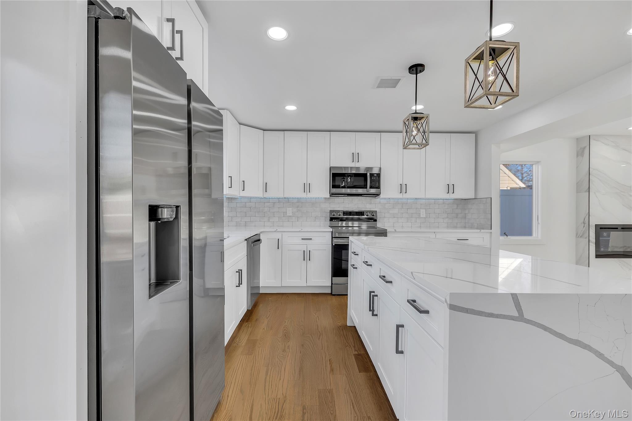 #11 photo, 22 Family Lane, Levittown , NY 11756