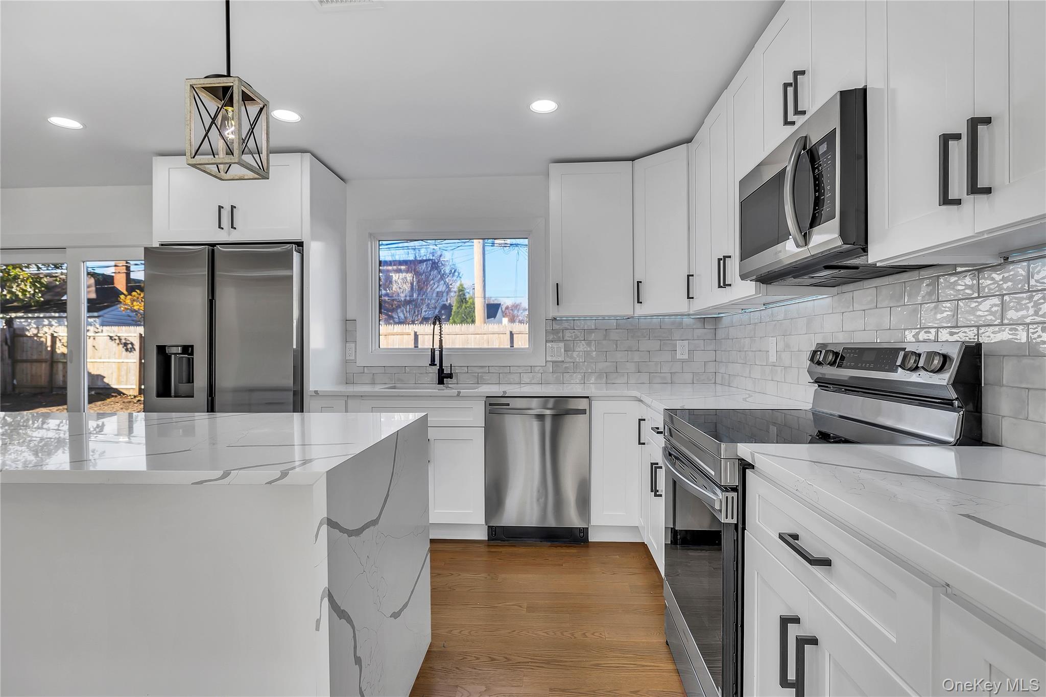 #9 photo, 22 Family Lane, Levittown , NY 11756