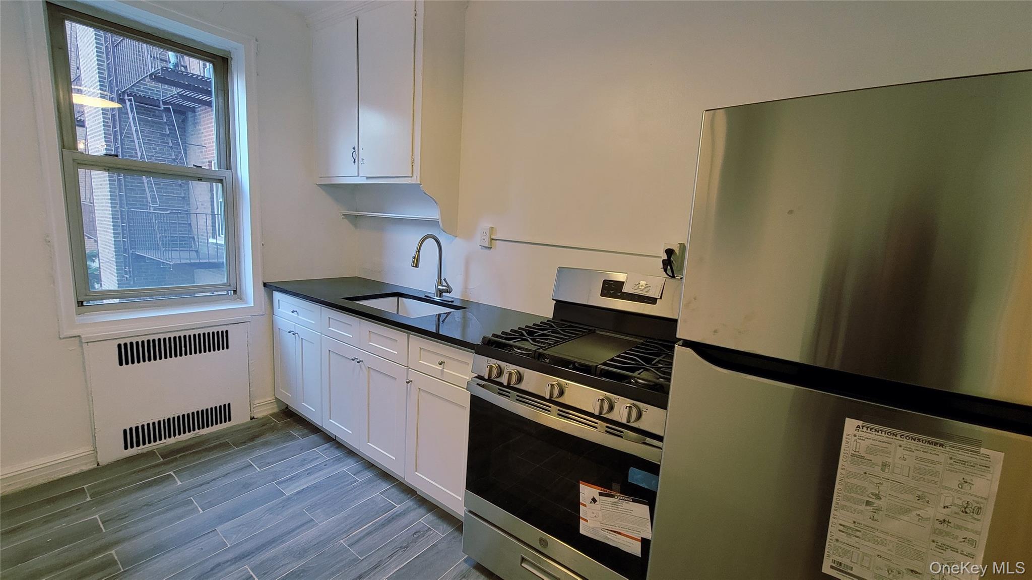 #3 photo, 84-49 168th Street, Jamaica Hills , NY 11432