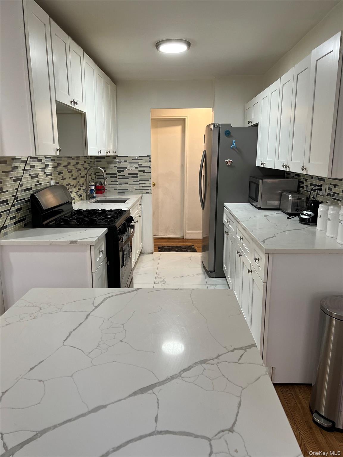 #11 photo, 94-10 59th Avenue, Elmhurst , NY 11373