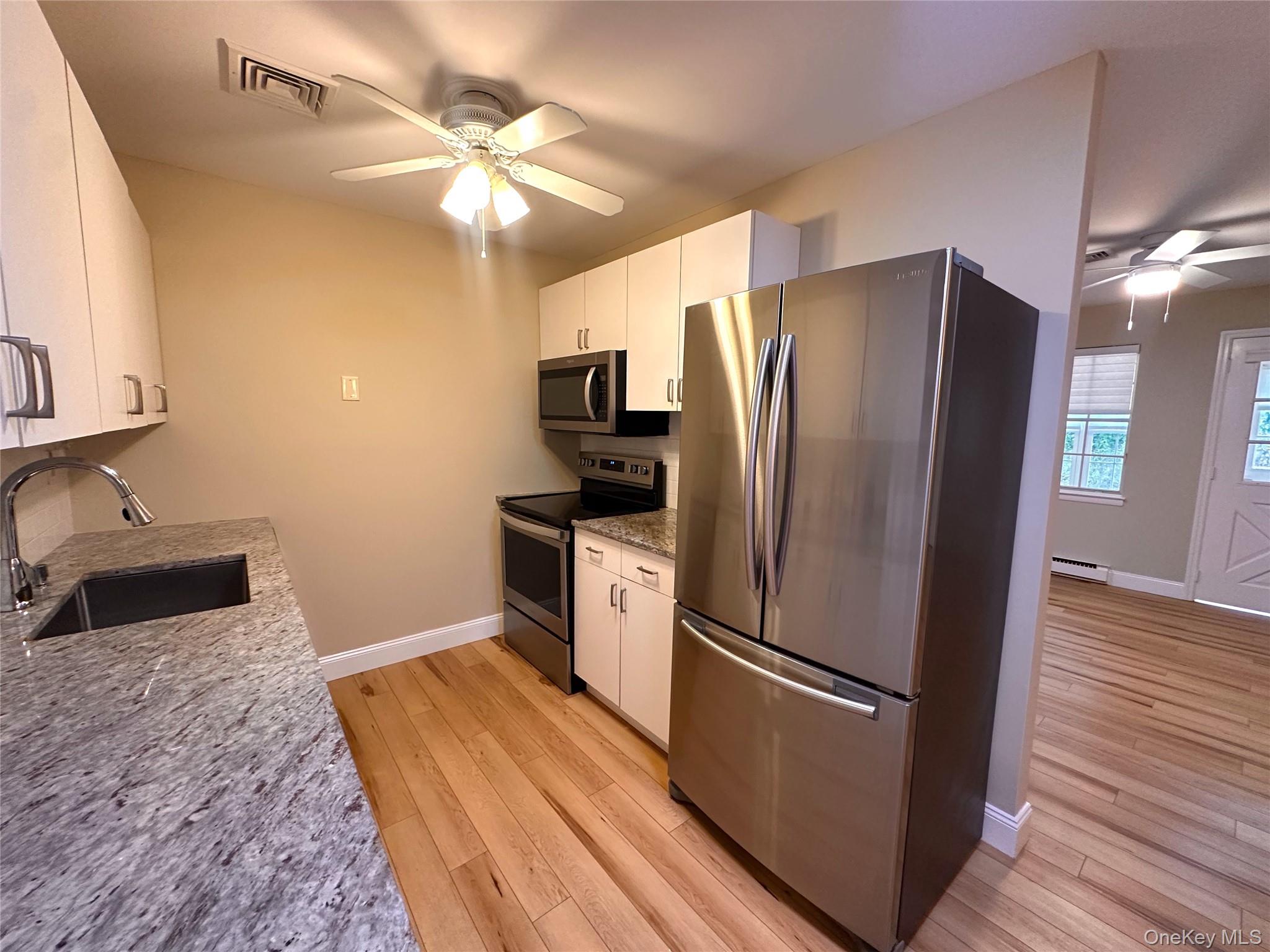 #7 photo, 312 Woodbridge Drive, Ridge , NY 11961