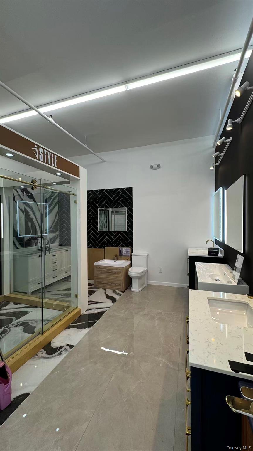 #7 photo, 22-28 Hempstead Turnpike, Hempstead , NY 11735