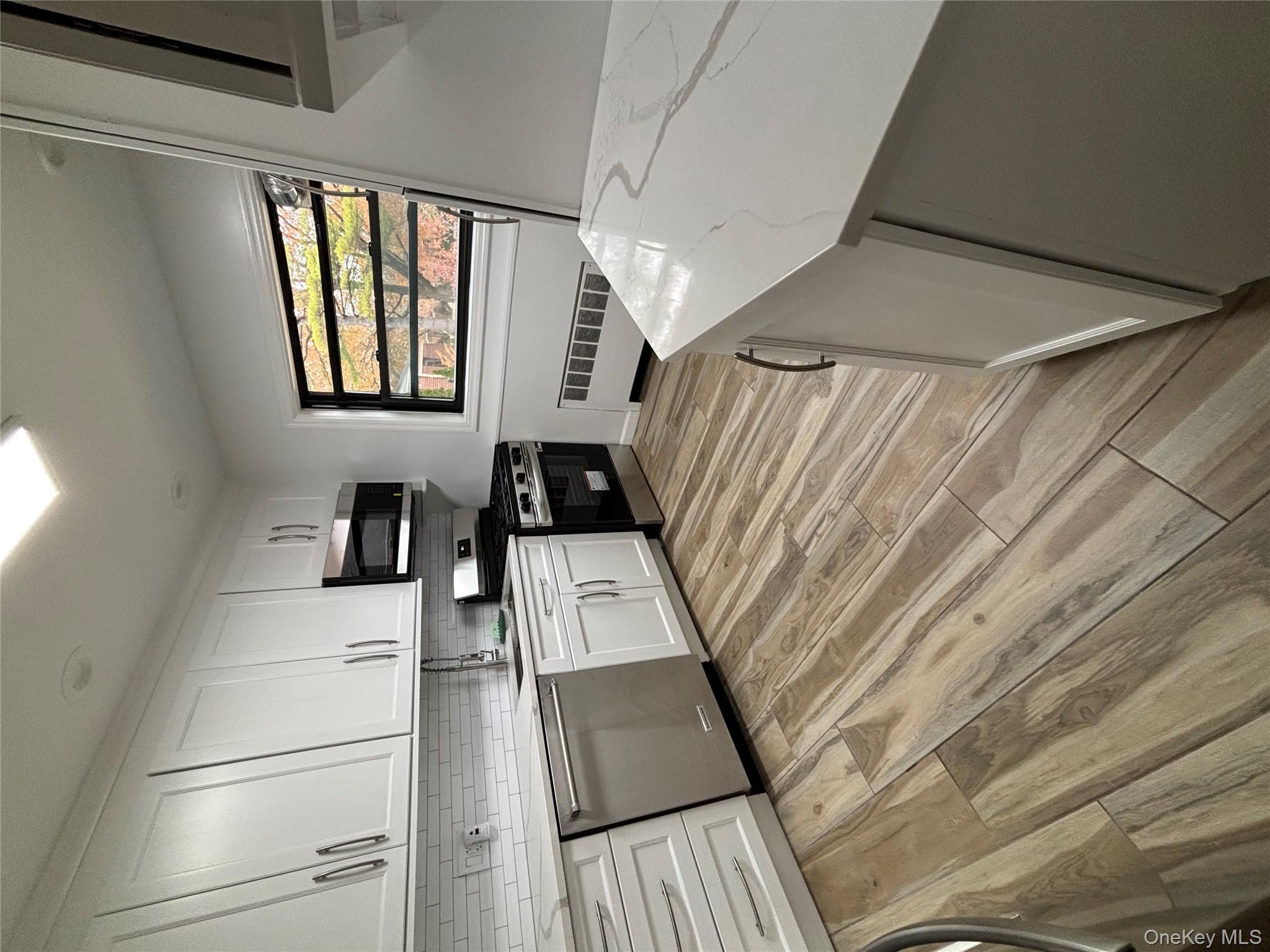 #5 photo, 219-07 74th Avenue, Oakland Gardens , NY 11364