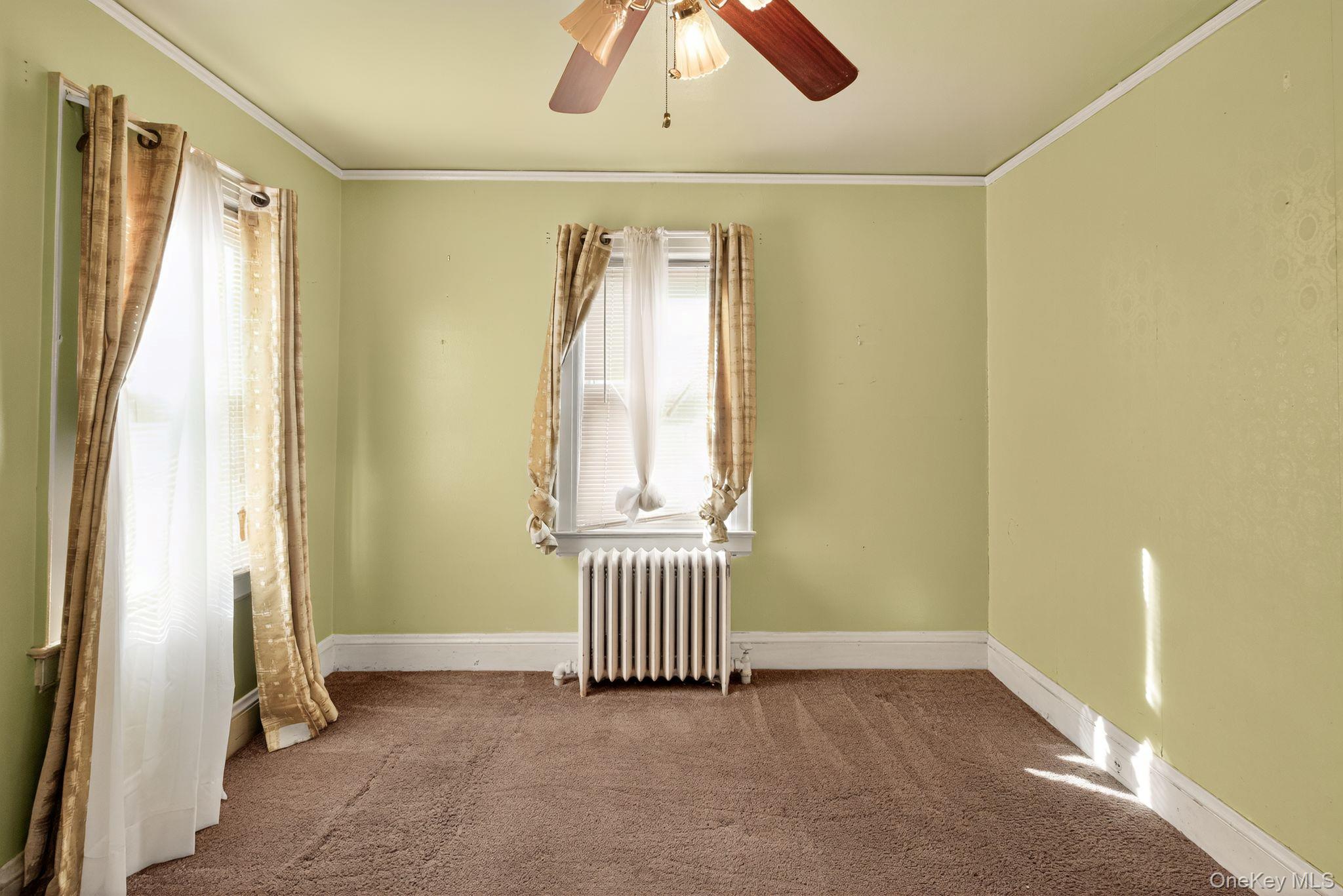 #12 photo, 82 E Clinton Avenue, Roosevelt , NY 11575