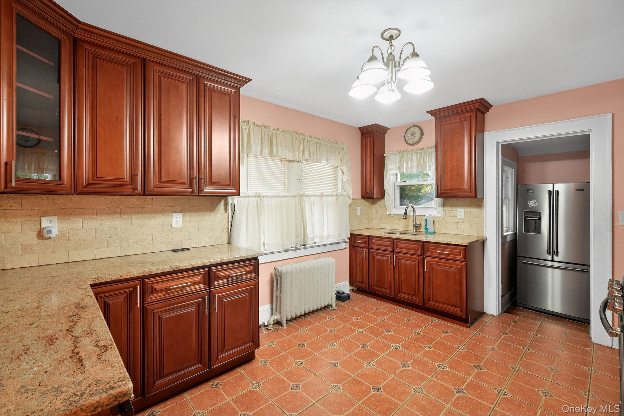 #16 photo, 82 E Clinton Avenue, Roosevelt , NY 11575