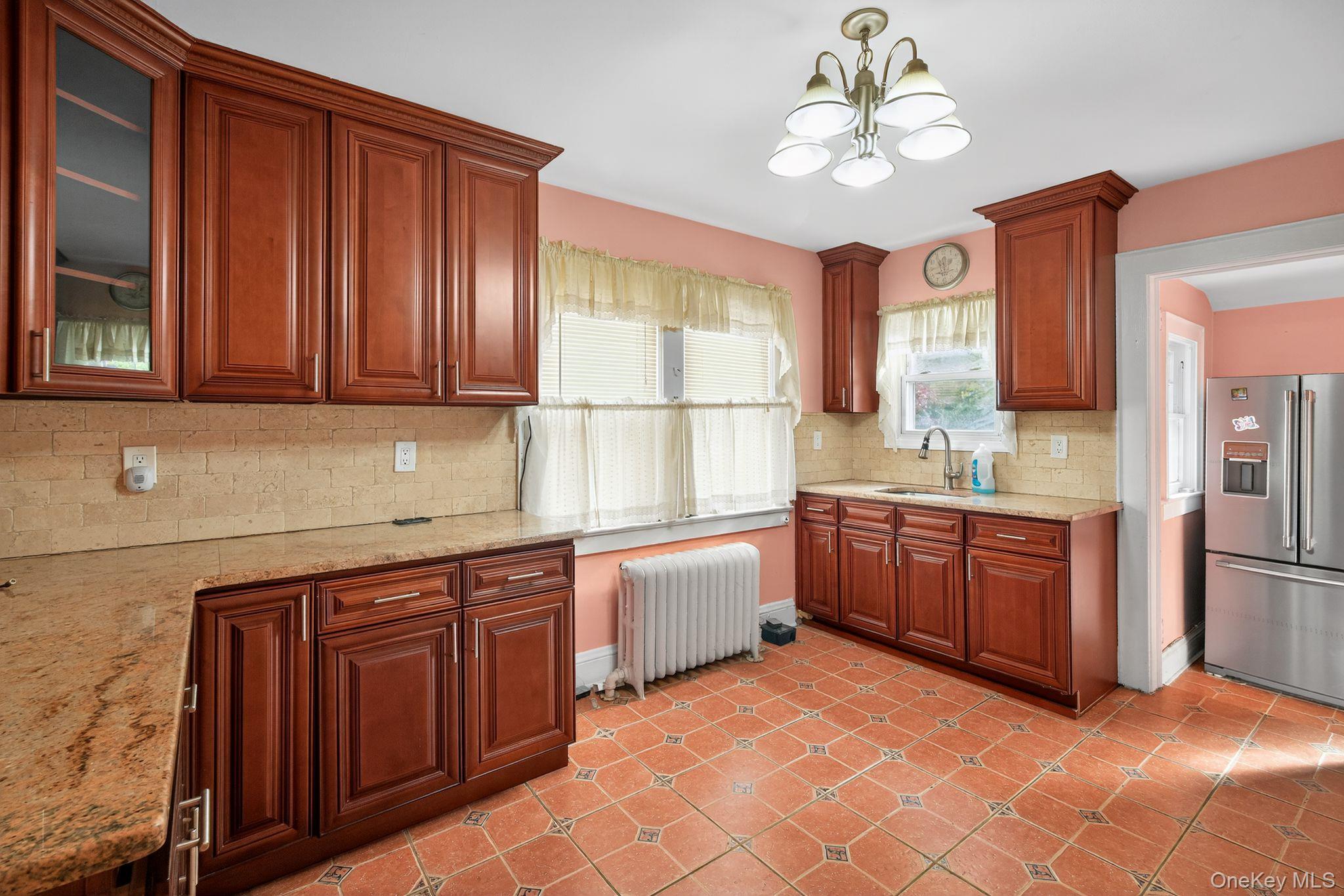 #19 photo, 82 E Clinton Avenue, Roosevelt , NY 11575