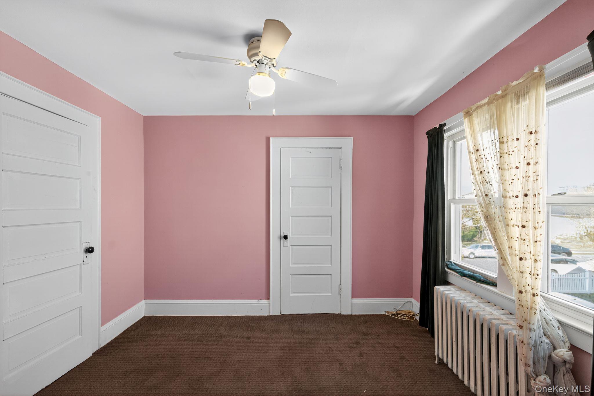 #5 photo, 82 E Clinton Avenue, Roosevelt , NY 11575