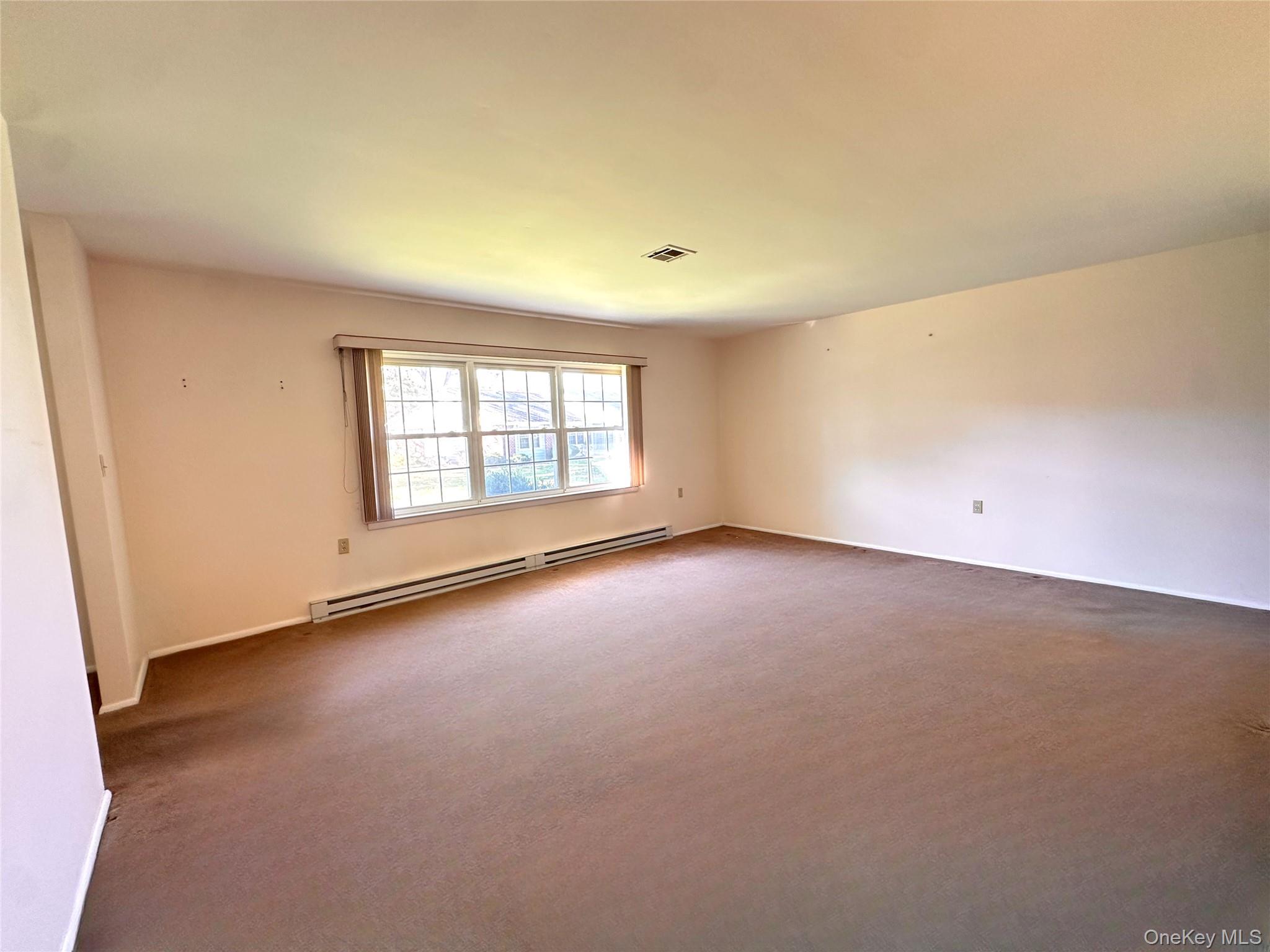 #4 photo, 215 Woodbridge Drive, Ridge , NY 11961