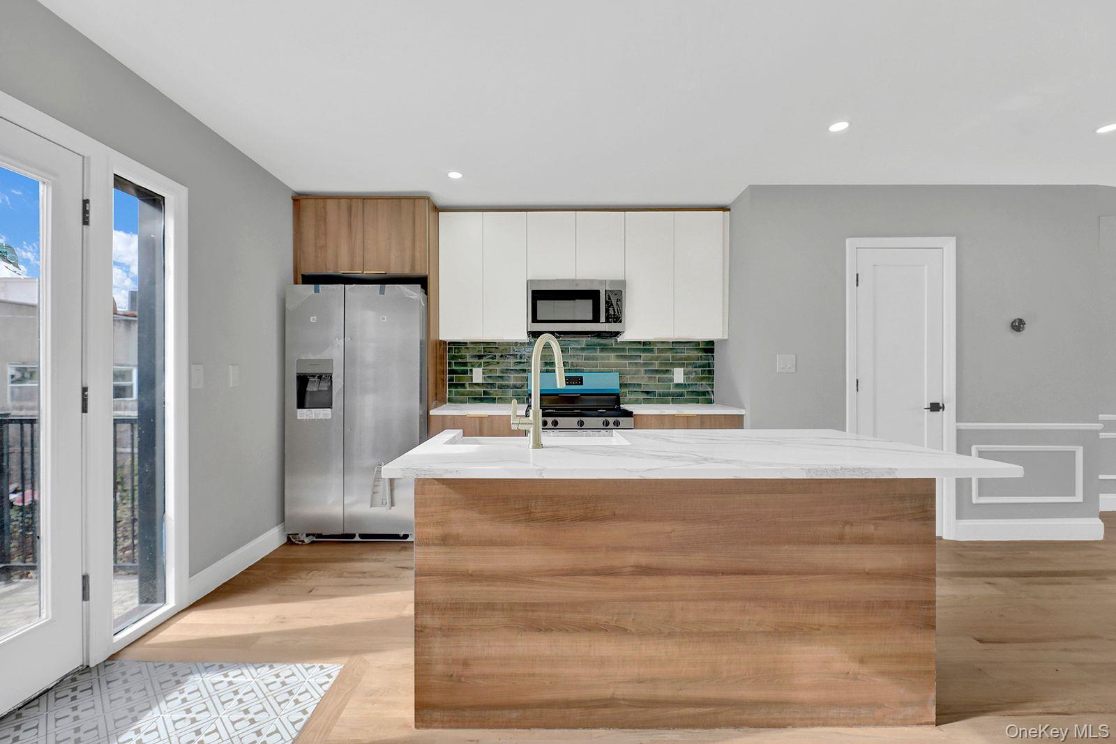 #3 photo, 217-14 133rd Road, Springfield Gardens , NY 11413