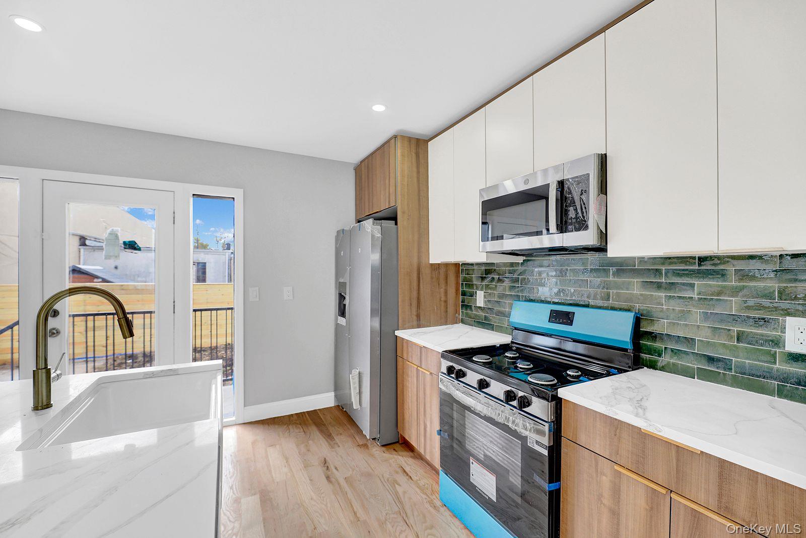 #5 photo, 217-14 133rd Road, Springfield Gardens , NY 11413