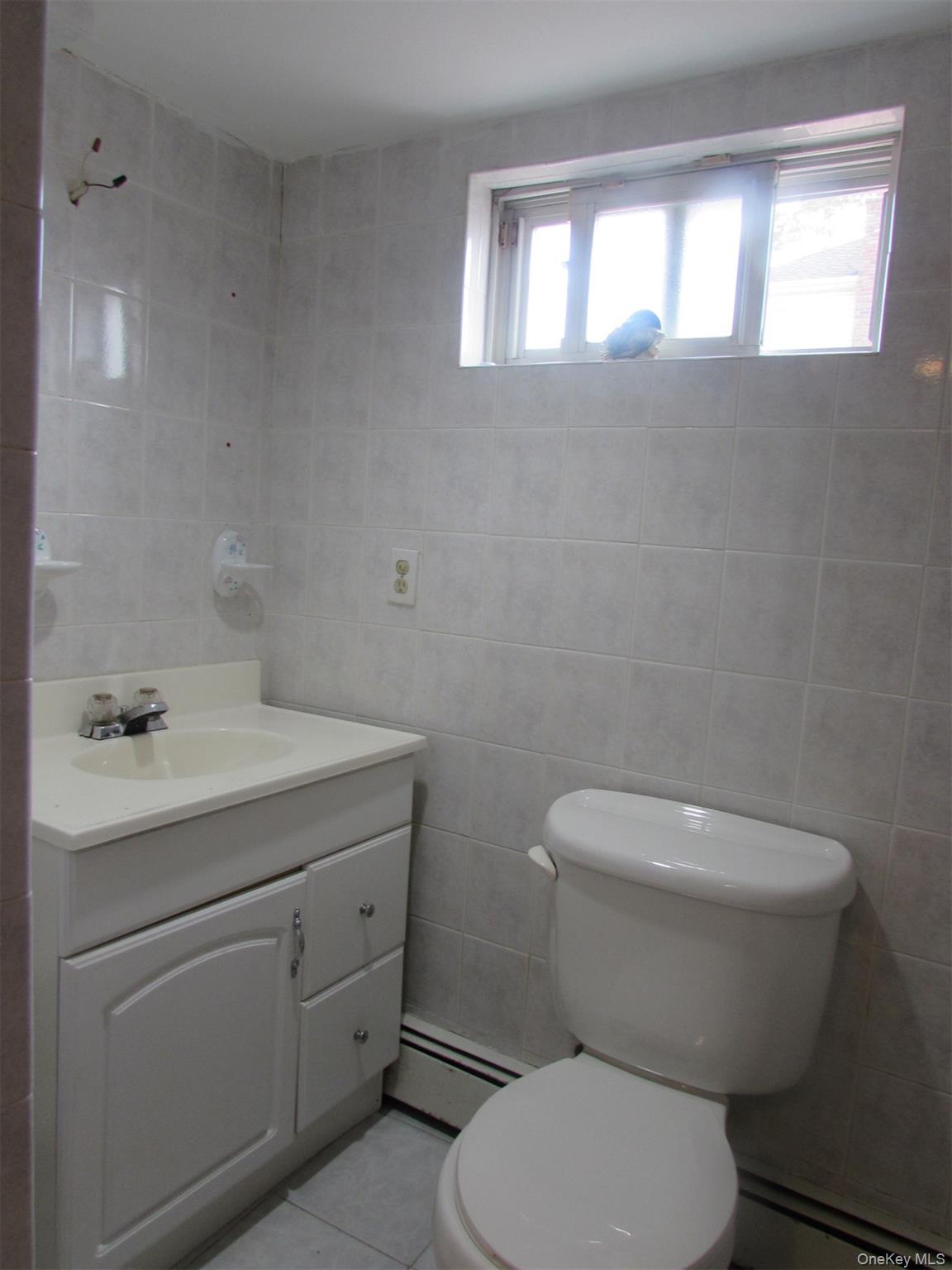 #14 photo, 828 Windmill Avenue, West Babylon , NY 11704