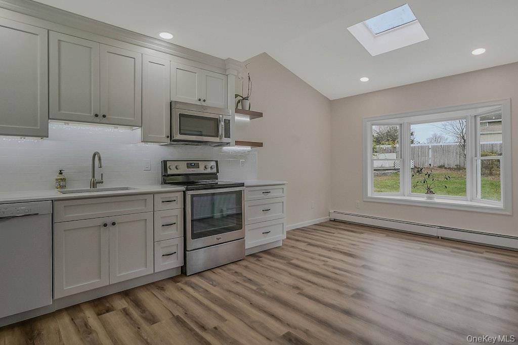 #11 photo, 21 Crater Lake Drive, Coram , NY 11727