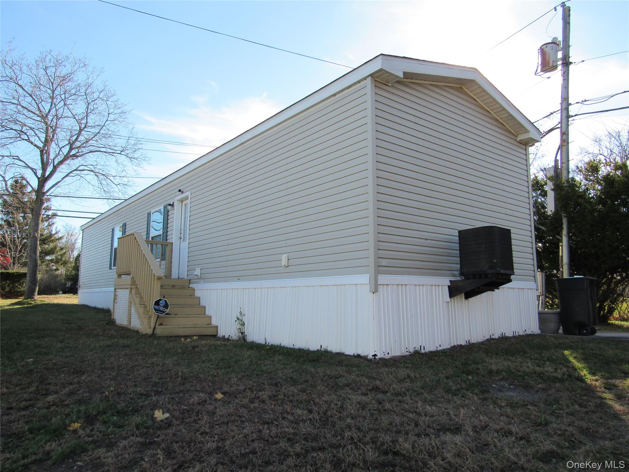 #5 photo, 1964-109 River Road, Calverton , NY 11933