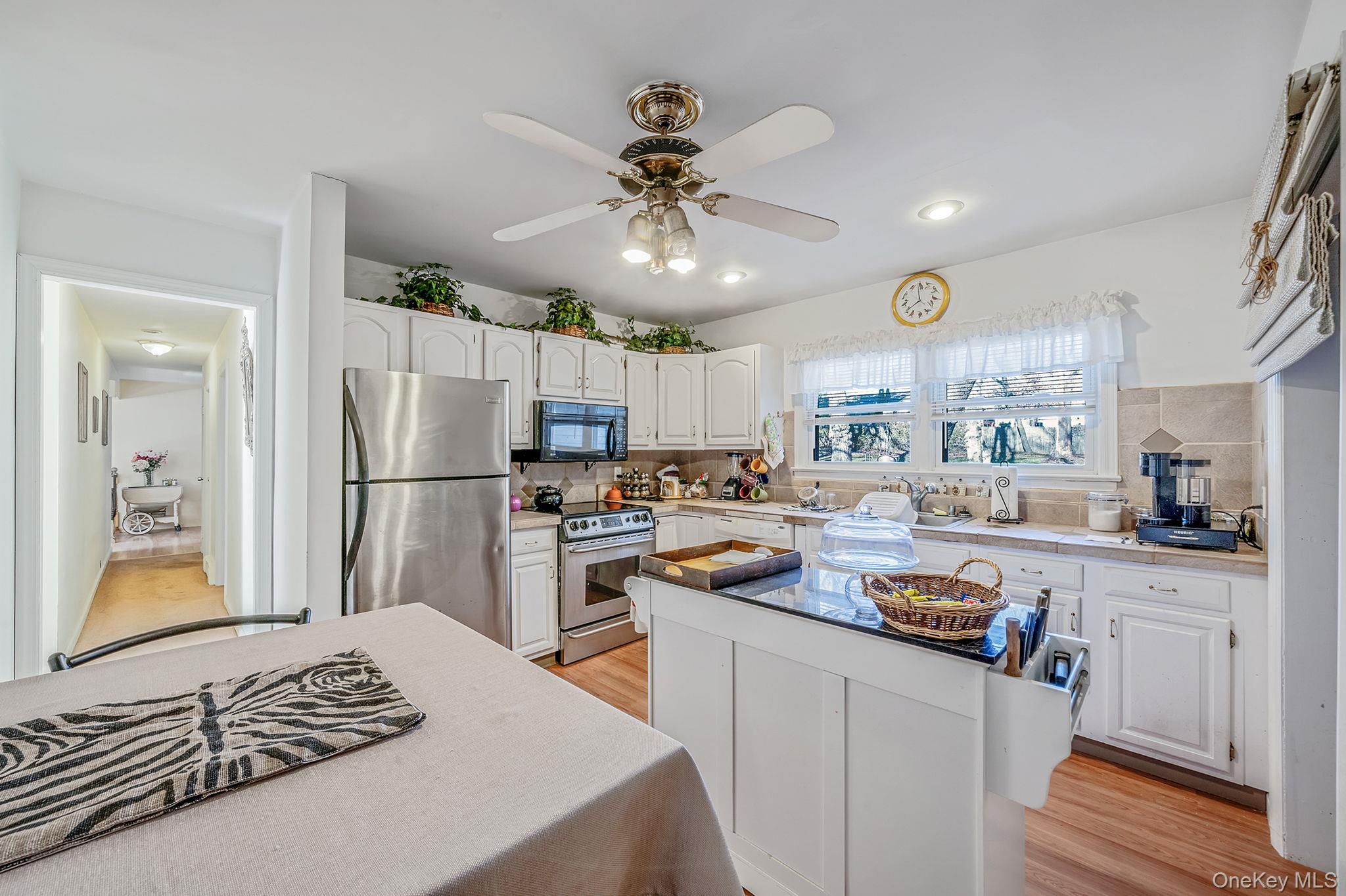 #12 photo, 17 Coram Swezeytown Road, Coram , NY 11727