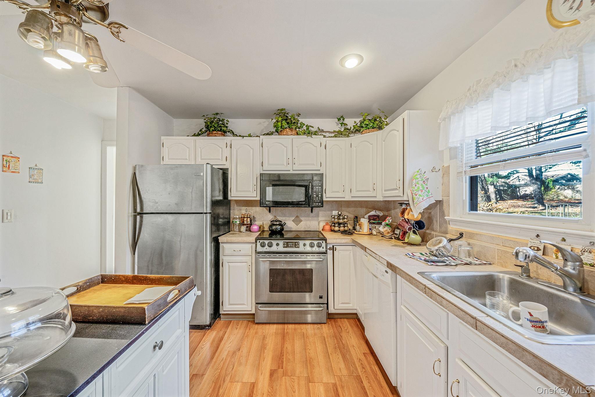 #13 photo, 17 Coram Swezeytown Road, Coram , NY 11727