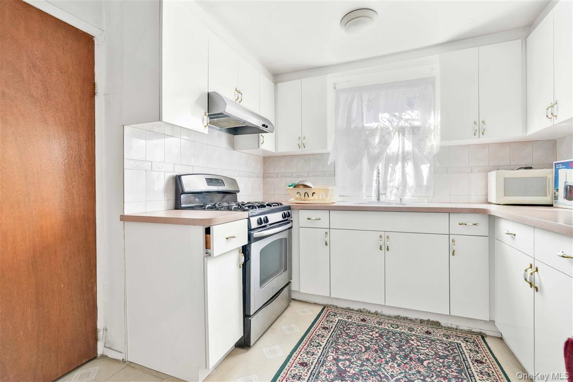 #13 photo, 10930 128th Street, South Ozone Park , NY 11420