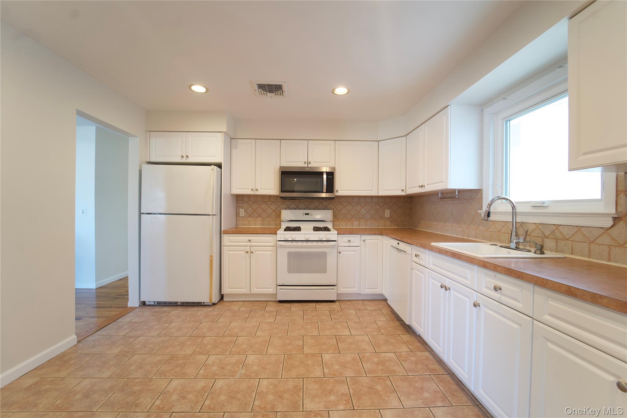 #4 photo, 556 E Harrison Street, Long Beach , NY 11561