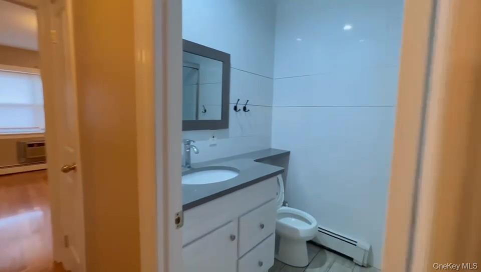 #4 photo, 57-32 136th Street, Flushing , NY 11355