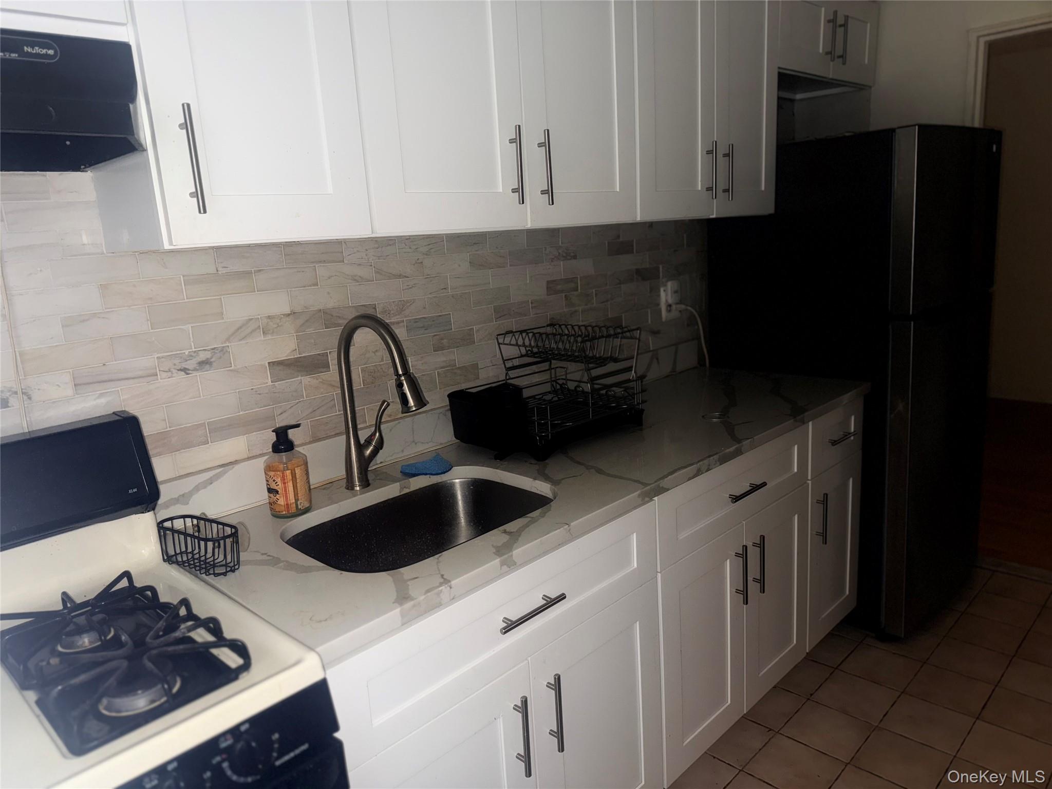 #14 photo, 147-14 84 Road, Briarwood , NY 11435