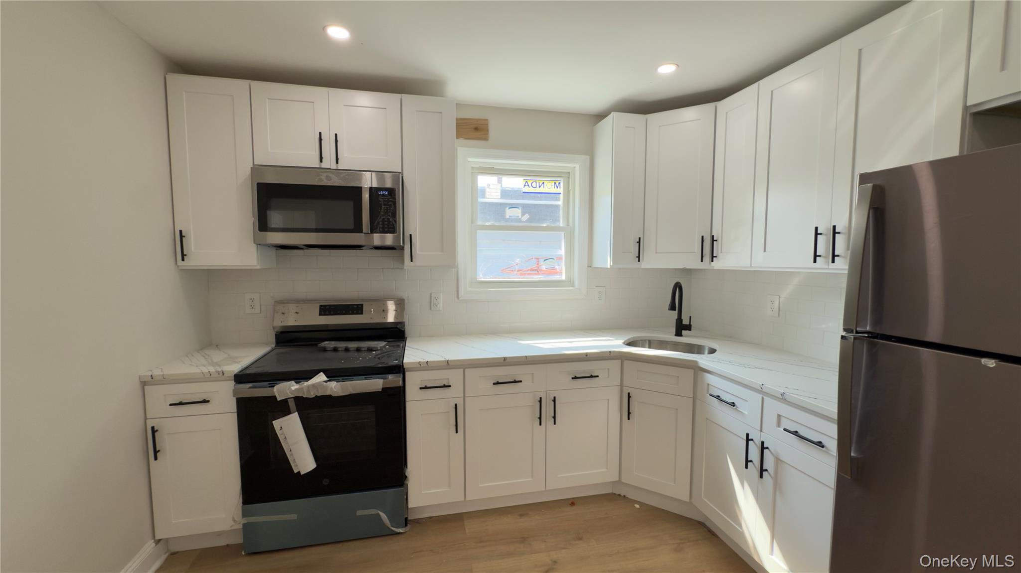 #12 photo, 120 linden, Hempstead , NY 11550