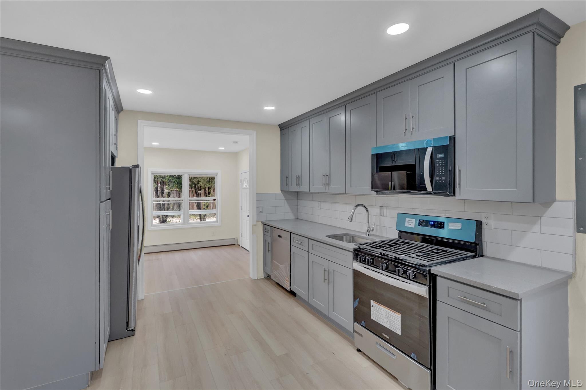 #14 photo, 12 Carlls Path, North Babylon , NY 11703