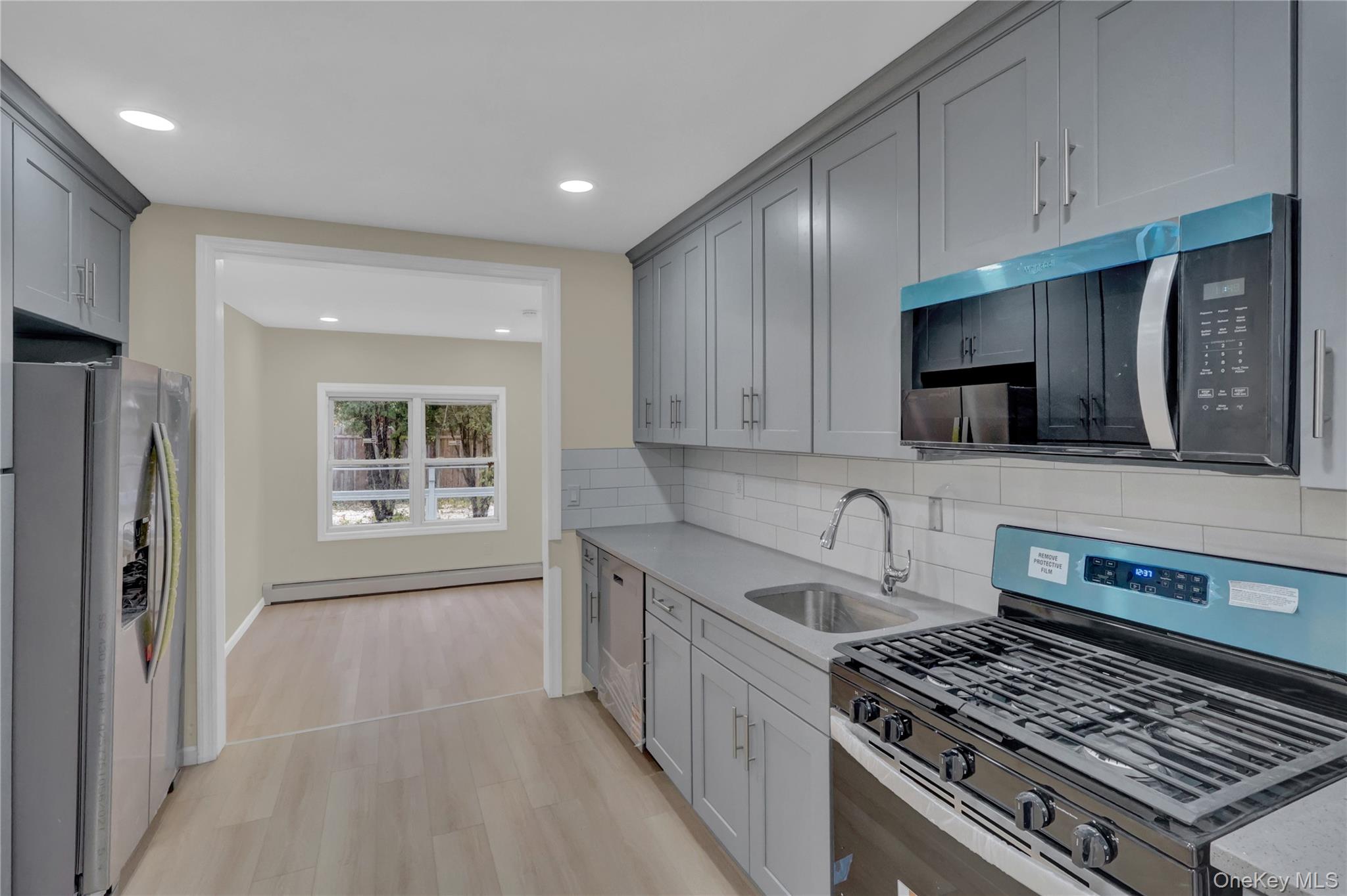 #15 photo, 12 Carlls Path, North Babylon , NY 11703