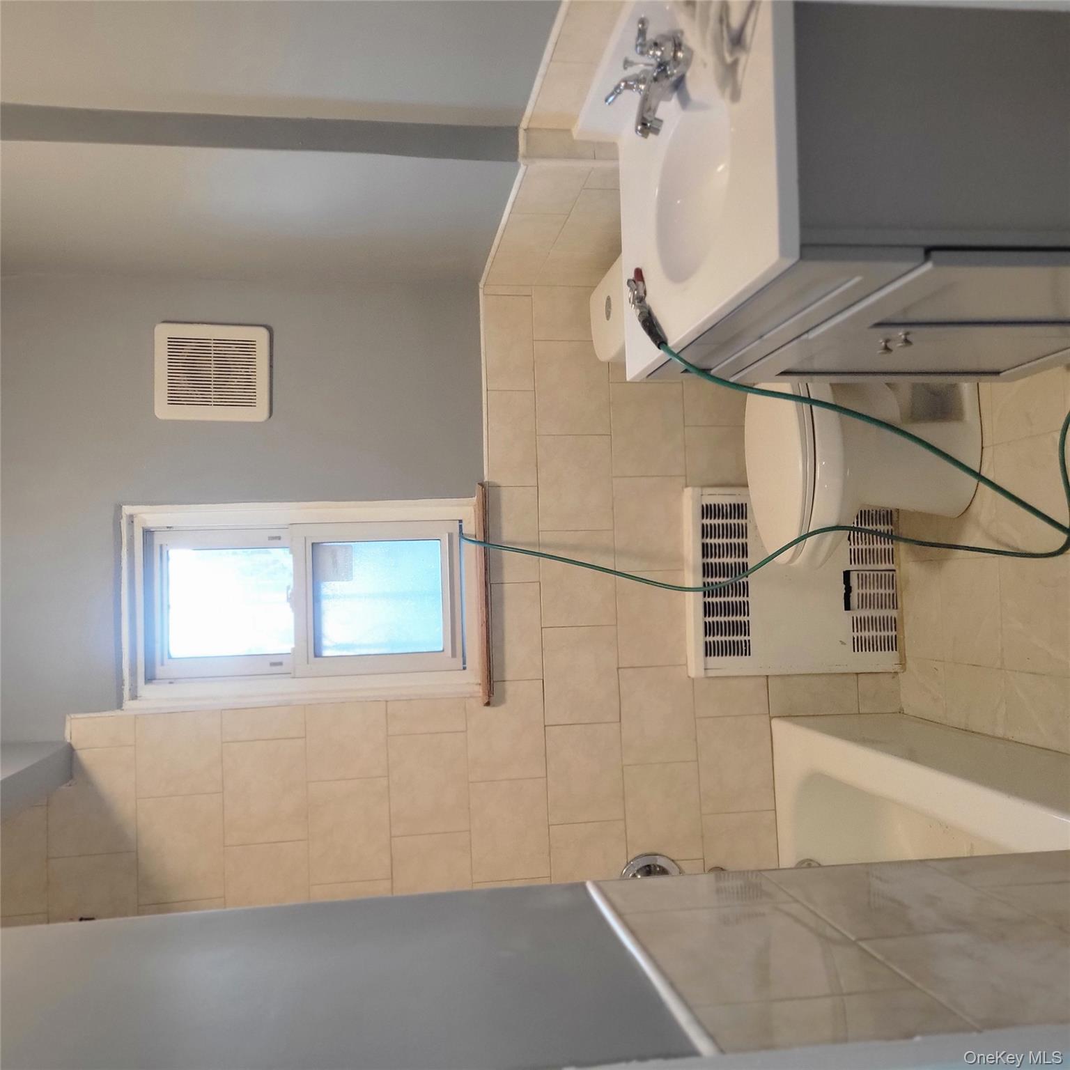 #13 photo, 11924 203rd Street, Saint Albans , NY 11412