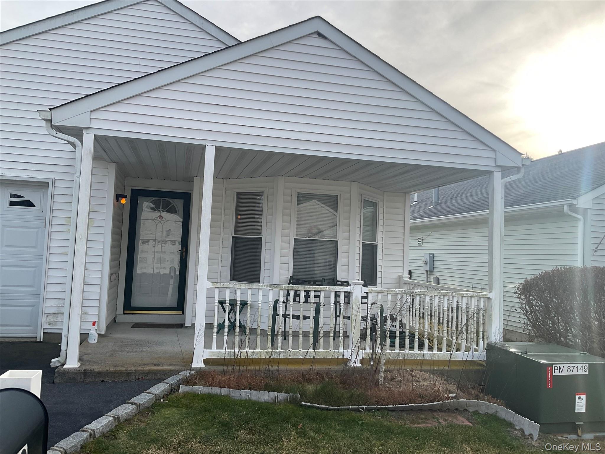 #1 photo, 409 Village Circle, Manorville , NY 11949