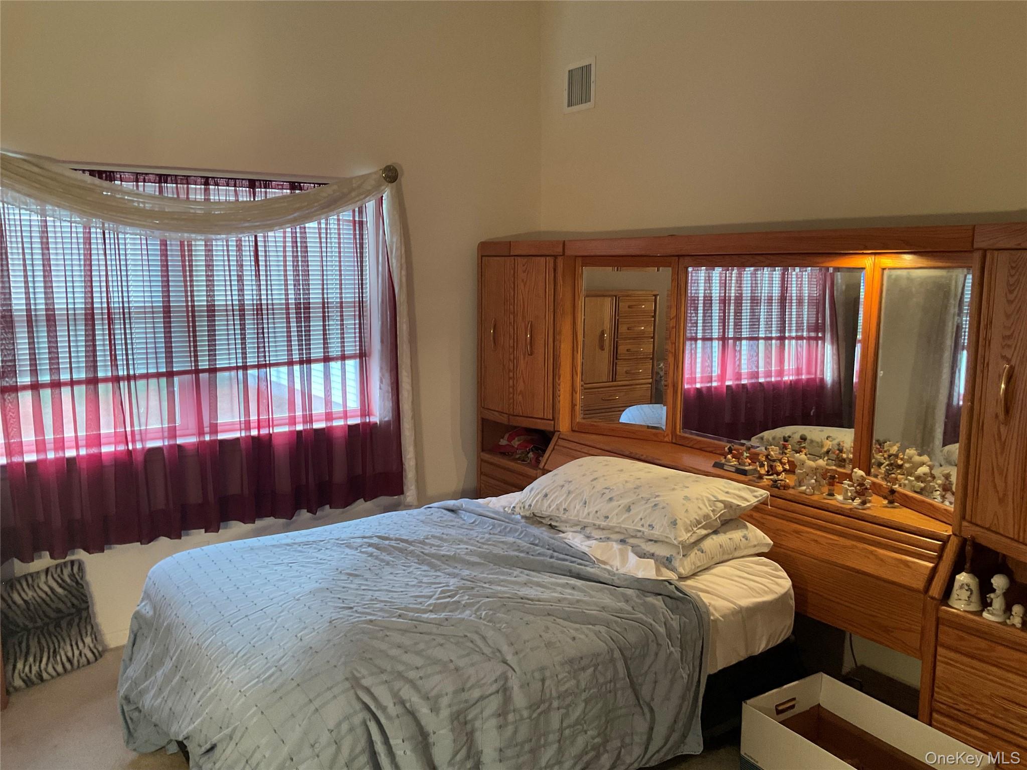 #12 photo, 409 Village Circle, Manorville , NY 11949