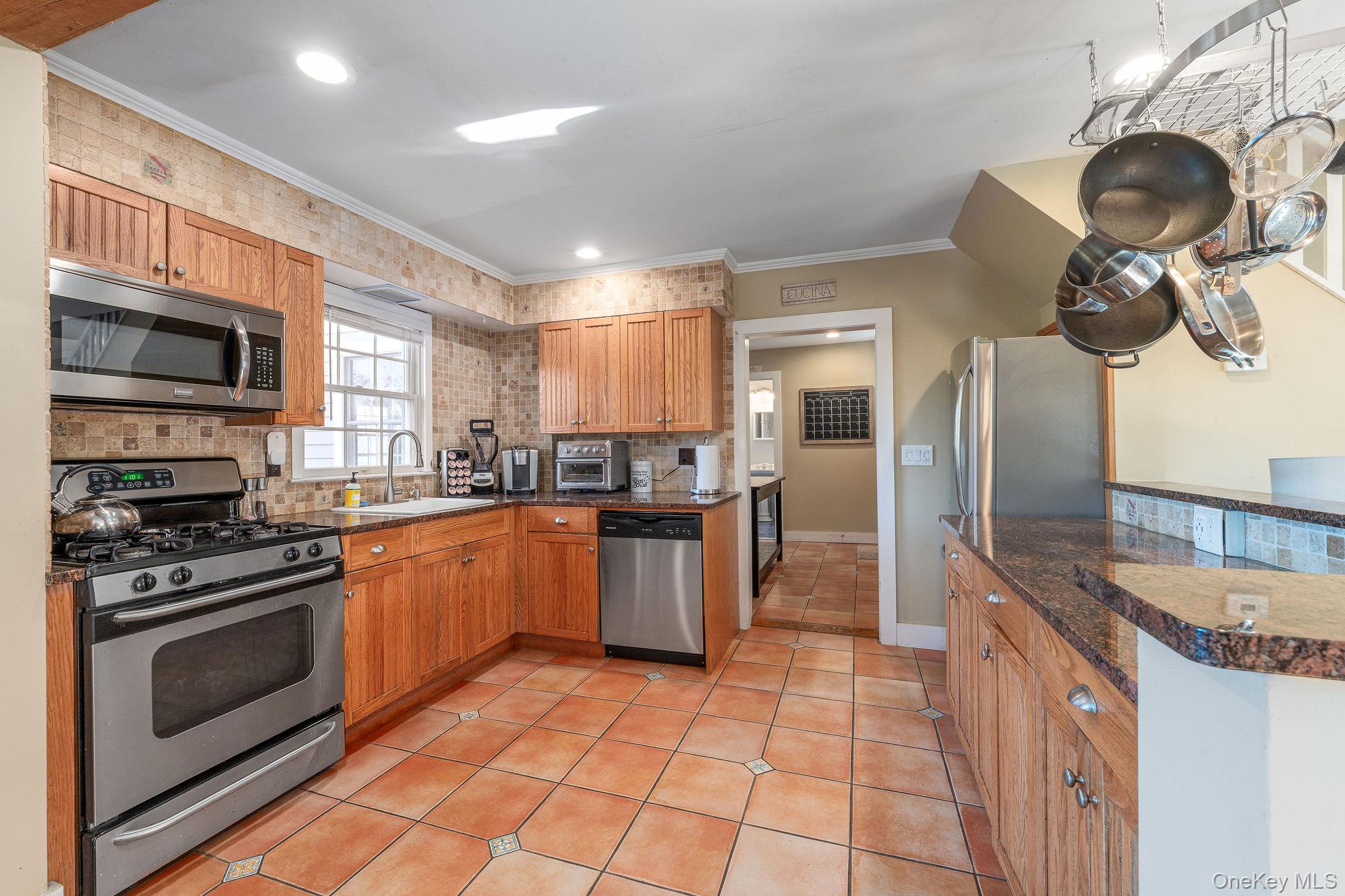 #6 photo, 735 aka 718 Wiggins Wiggins Street, Greenport , NY 11944